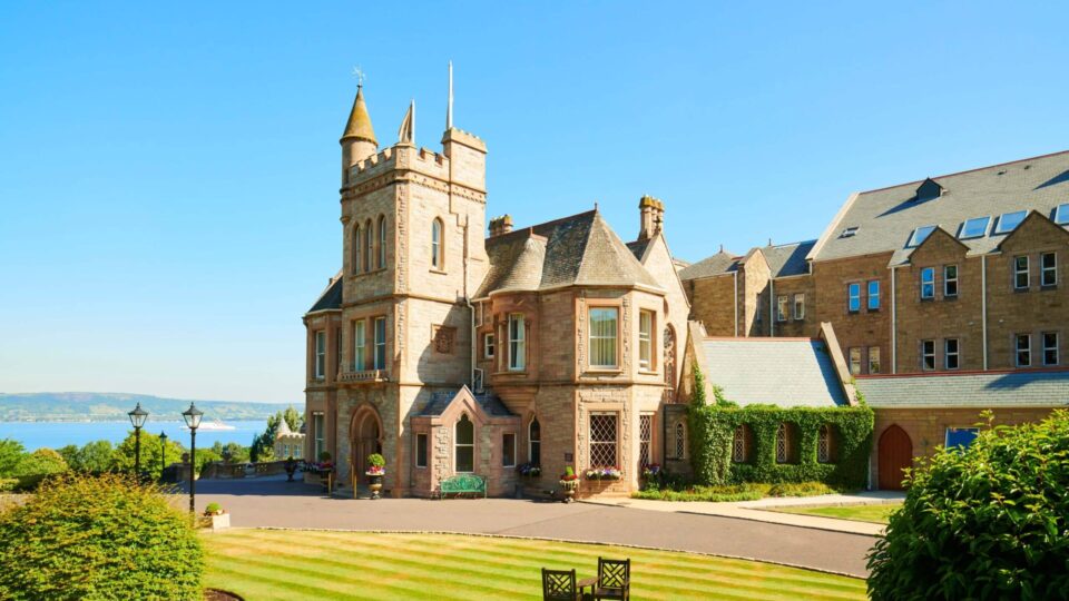 Elegant hotel with historic architecture, lush gardens, and stunning sea views, offering a tranquil and luxurious retreat.