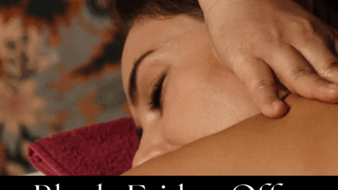 A woman receives a shoulder massage with text over the image stating